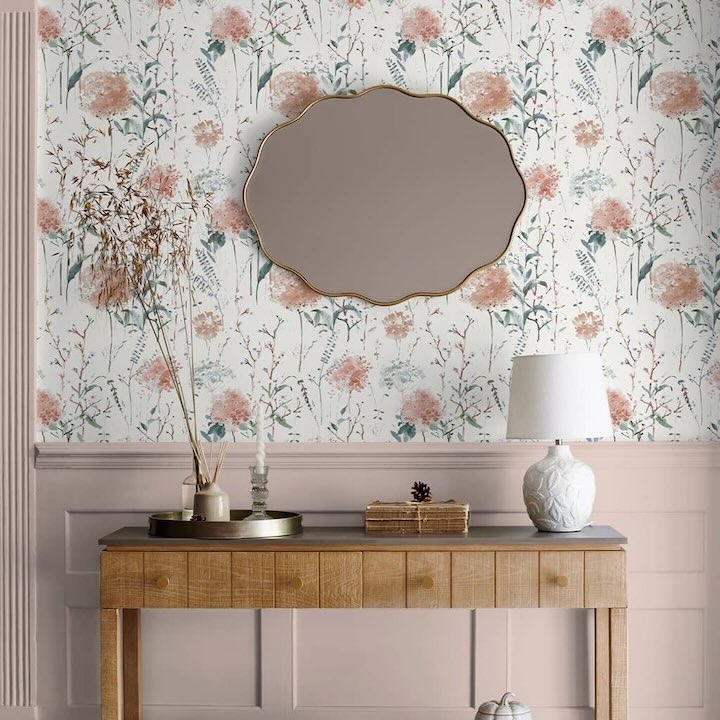 Laura Ashley eggshell paint Collection -  hallway wood panels painted with pale chalk pink coordinated with Pallington Bloom Plaster Pink Wallpaper 
